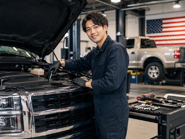 ピットスタッフ ／自動車整備士（東証プライム上場・車載電子機器メーカーグループ／自動車ディーラー）